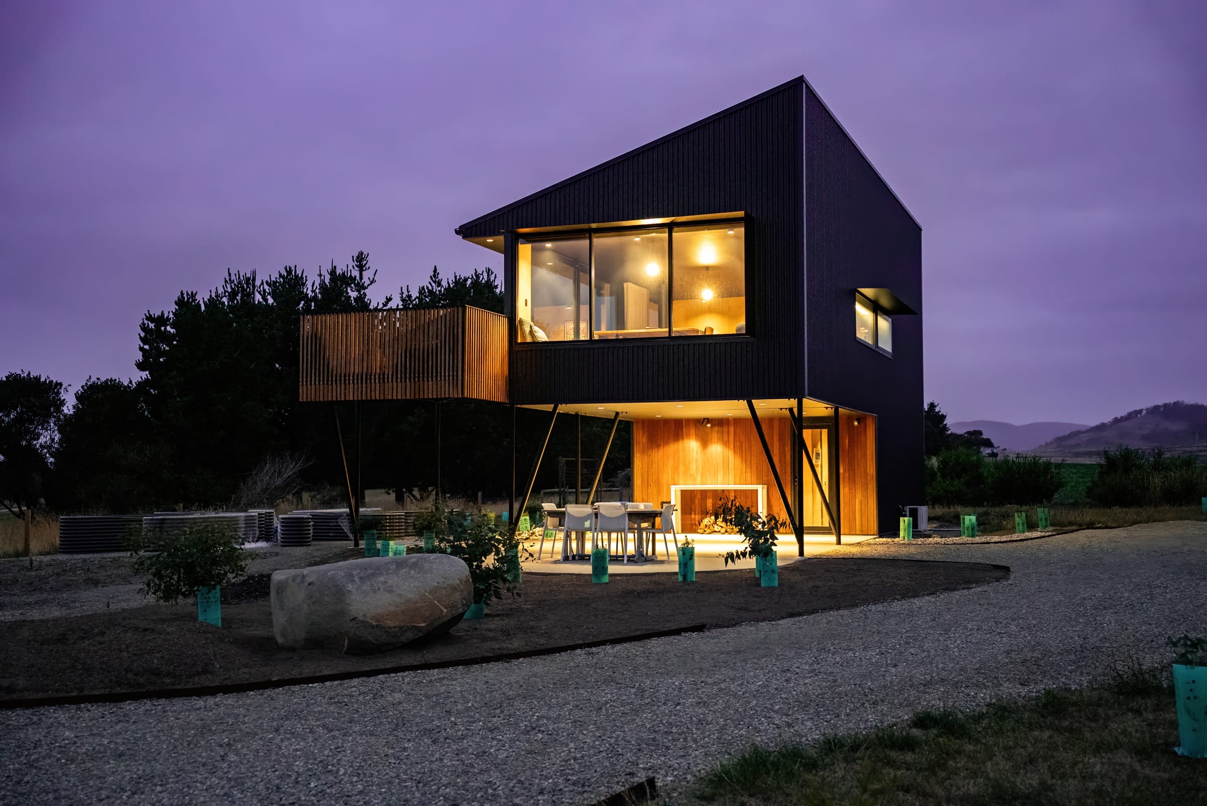 Newave, an elevated home at Falmouth, at dusk