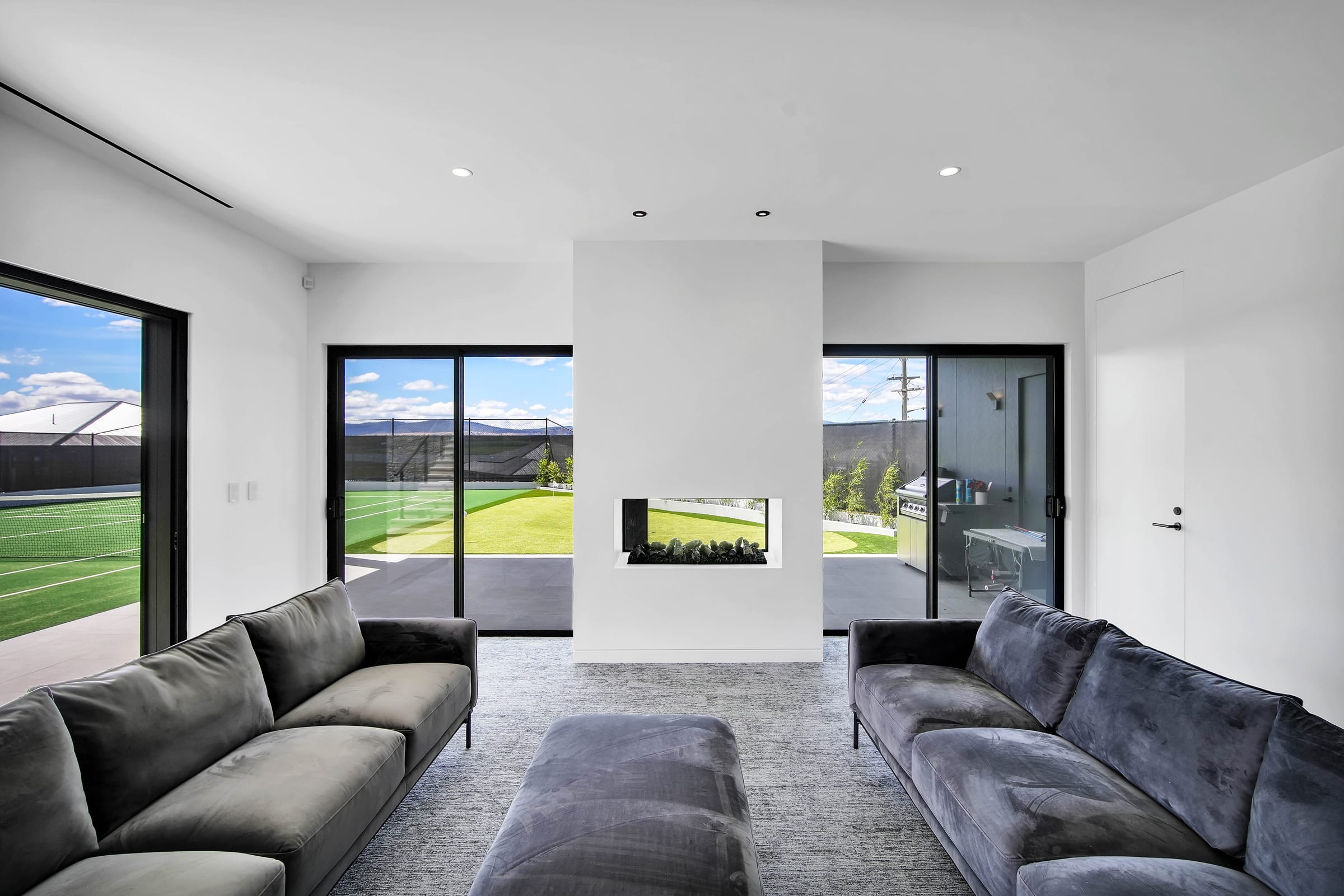 Living room at NIII, Launceston, with fireplace