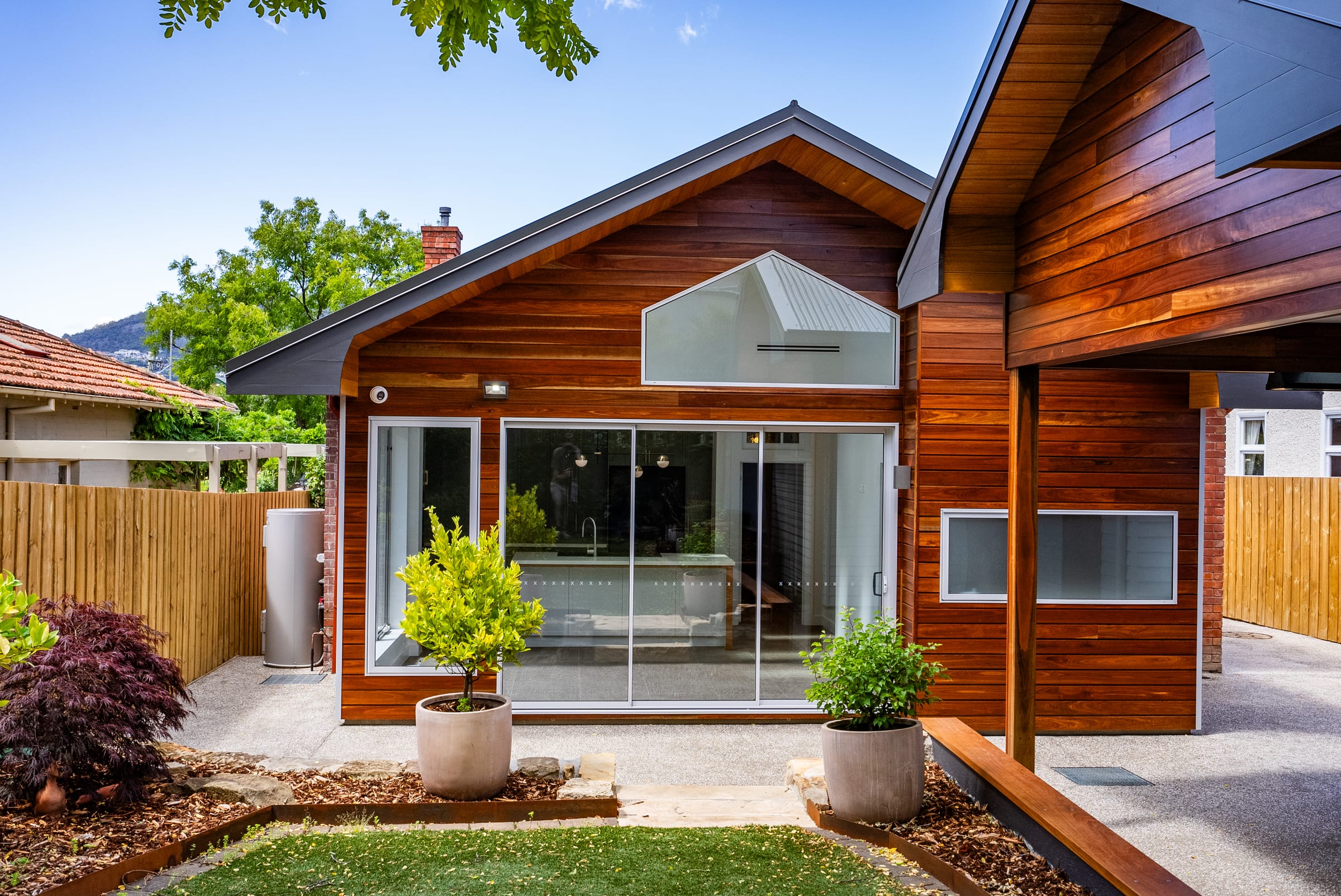 Rear extension in timber cladding at Verndene, Sandy Bay